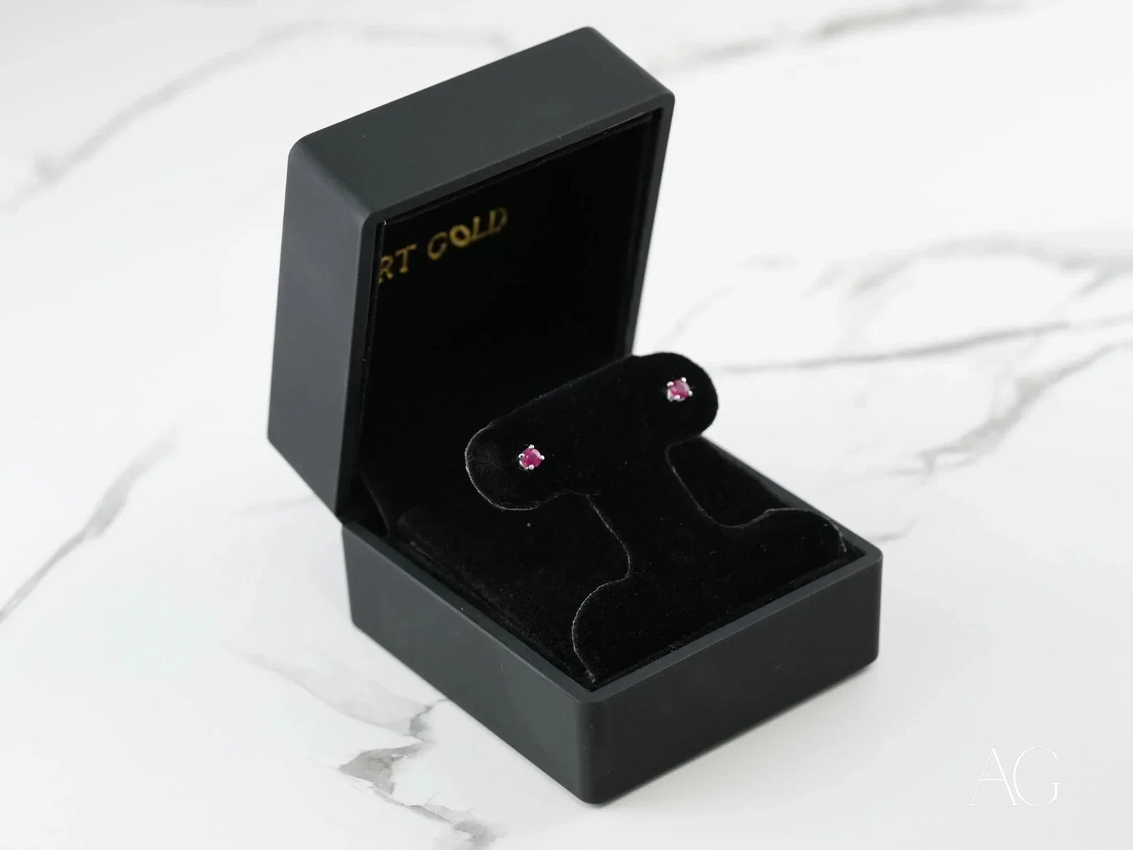 Scarlet Whispers white gold ruby earrings in black box