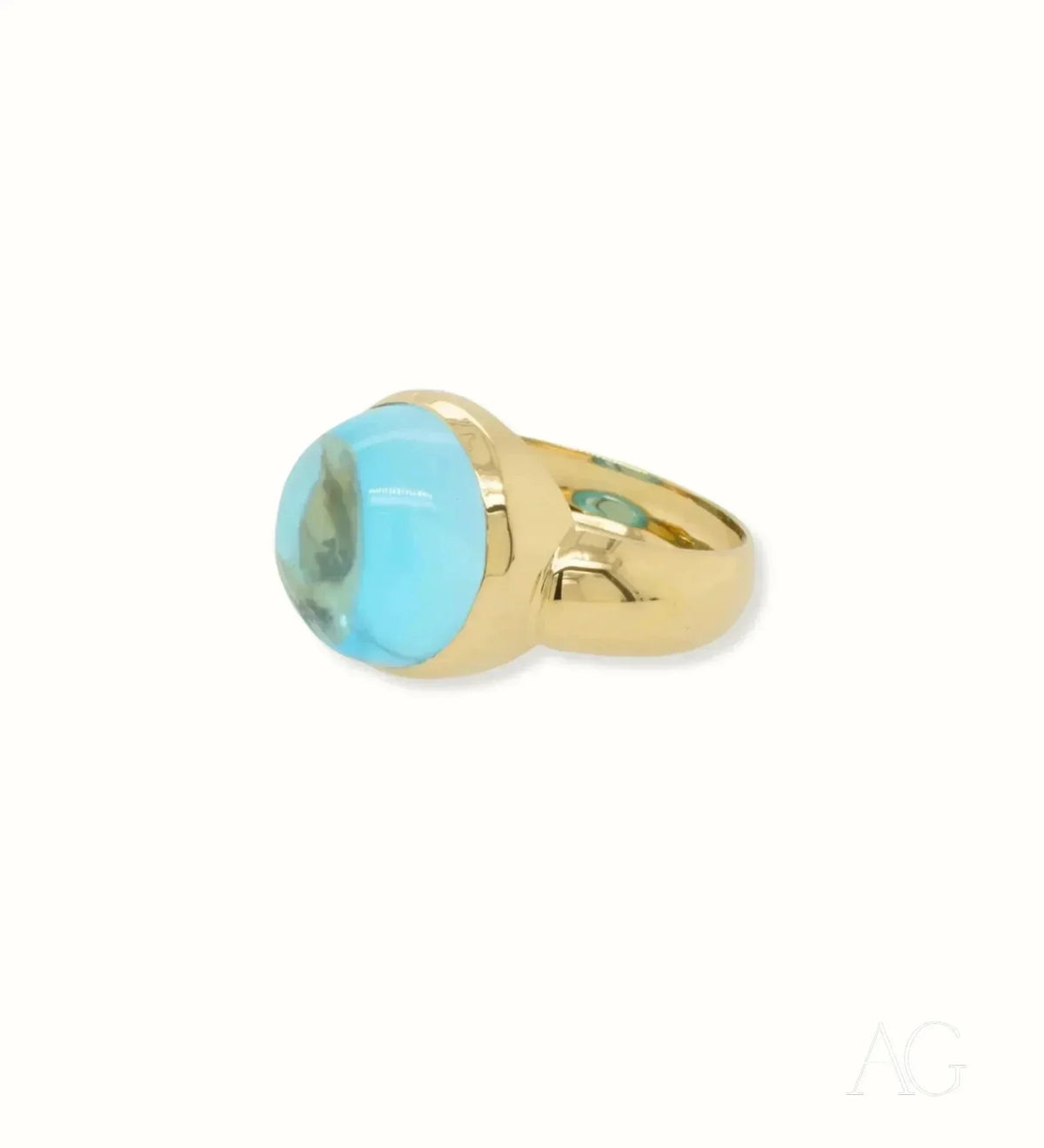 Serenity in Blue cabochon blue topaz ring with oval gemstone