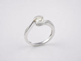 Twist of Light — Bypass Diamond Ring, side profile, bypass setting