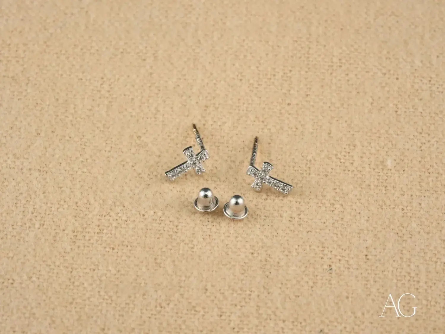 Silver cross stud earrings with sparkling crystals, timeless royal jewels