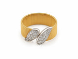 Top view of the two-tone wide band ring showing the two crossed white gold leaves set with diamonds.