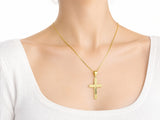 18K Gold Fluted Cross Pendant, L size, worn on a person showing the scale of the 20 x 30 mm cross