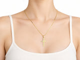 18K Gold Fluted Cross Pendant, M size, worn on a person showing the scale of the 17 x 25 mm cross