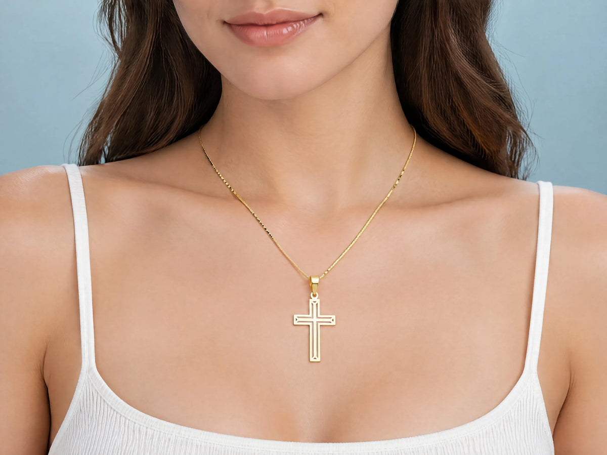 Openwork cross pendant L size worn for scale, 20 x 30 mm.