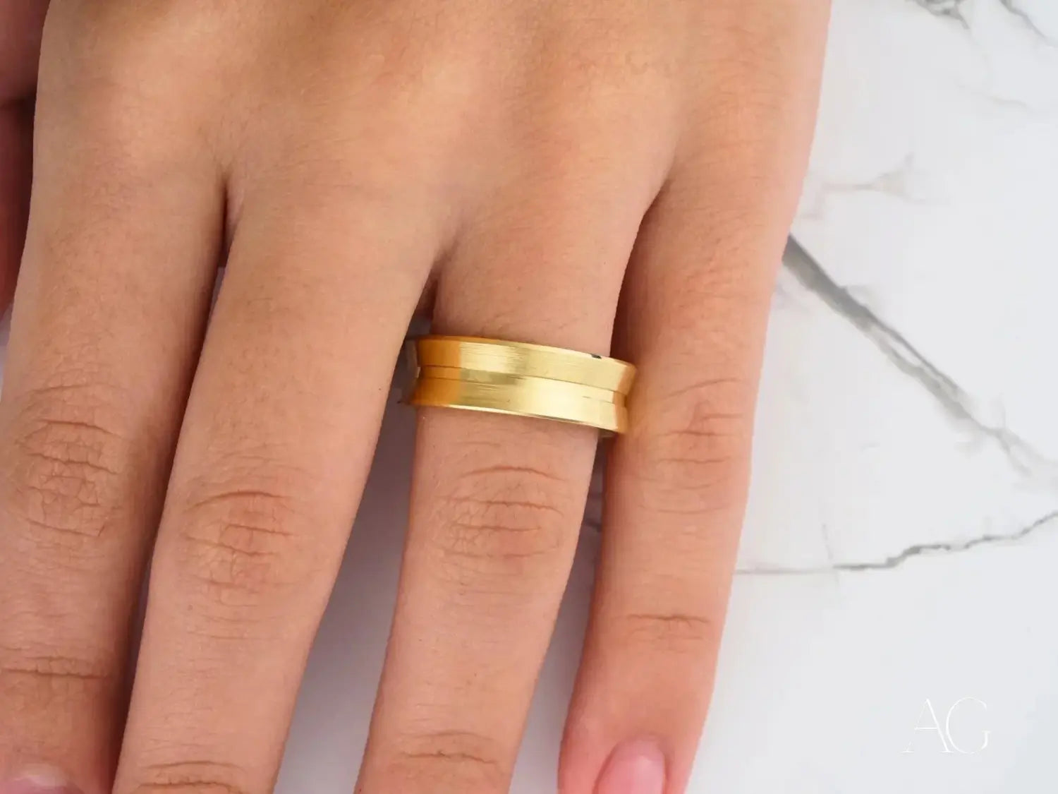 The mikimoto skyscraper highlights fine jewelry with its sleek glass facade and silver logo in an 18k gold jewelry article.