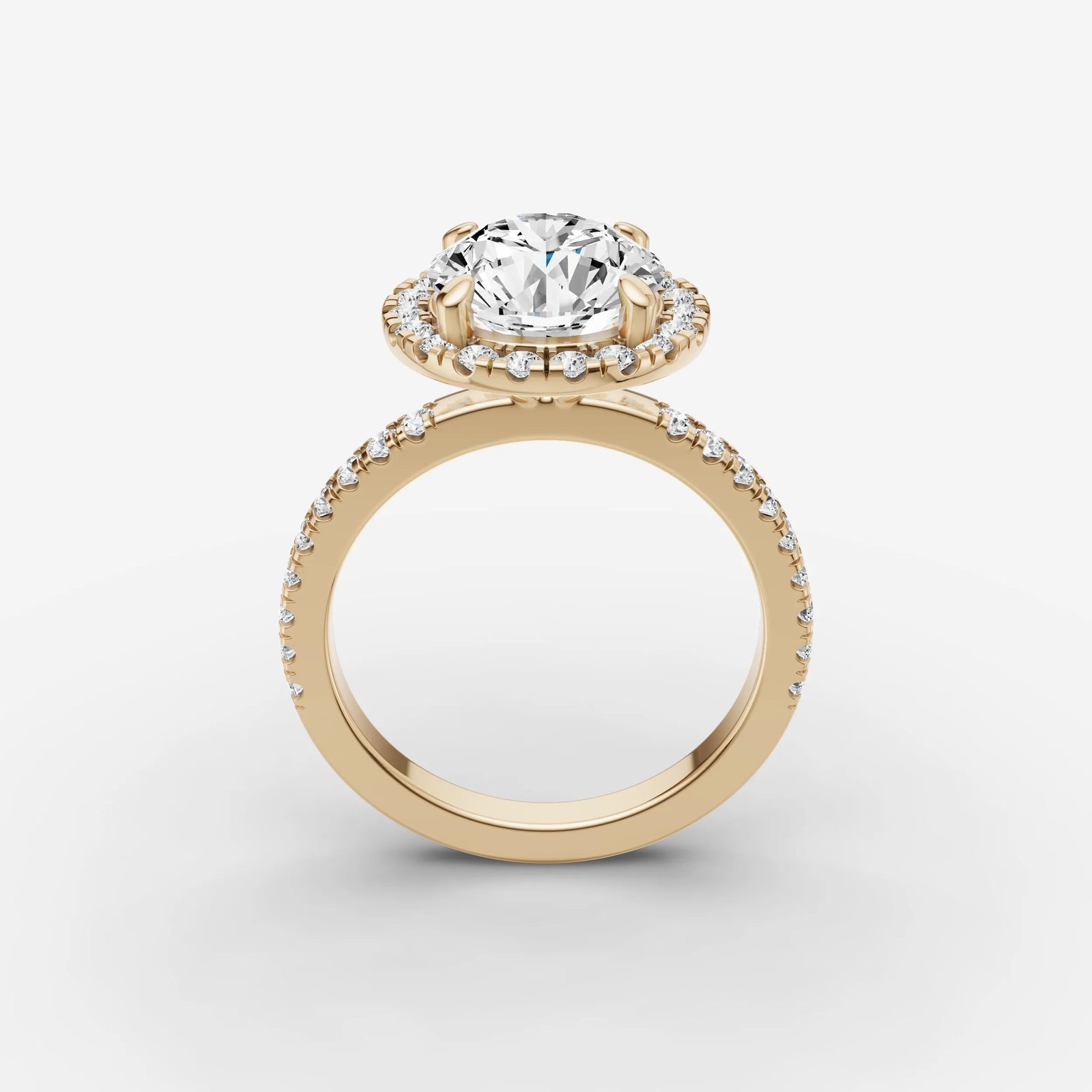Aurore Etoile round diamond setting in gold, side view