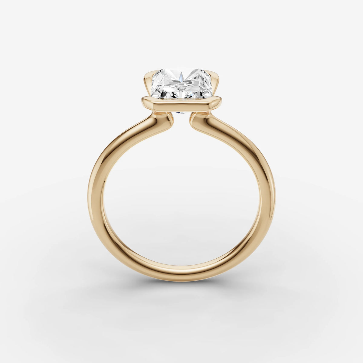 Demi radiant diamond setting in gold, side view