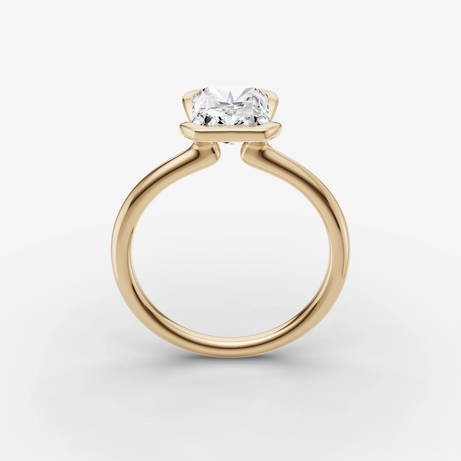 Demi radiant diamond setting in gold, side view