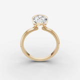Demi pear diamond setting in gold, side view
