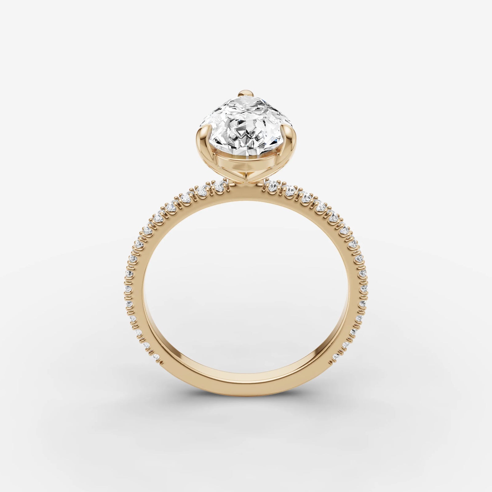 Etoile pear diamond setting in gold, side view
