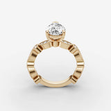 Heritage pear diamond setting in gold, side view