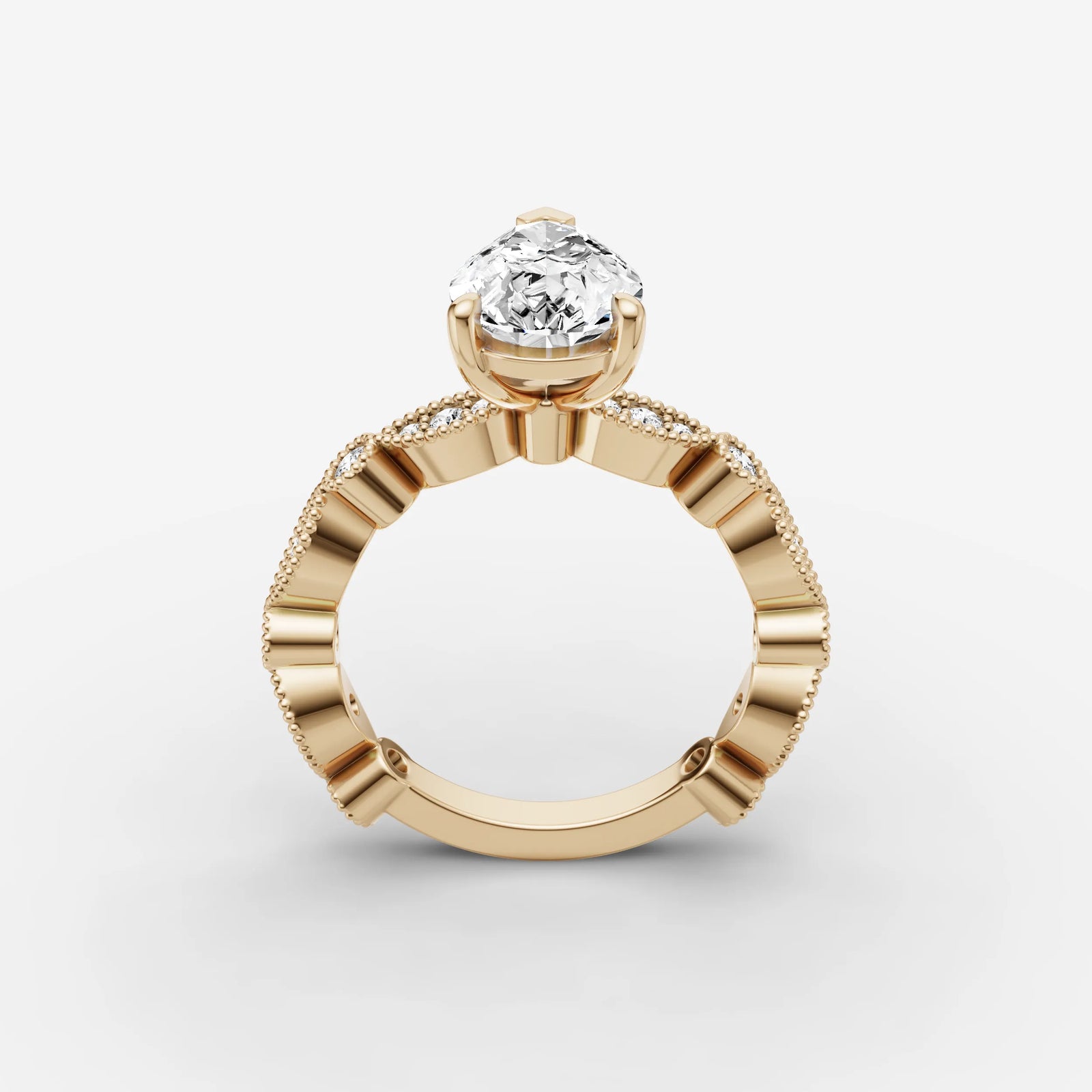 Heritage pear diamond setting in gold, side view