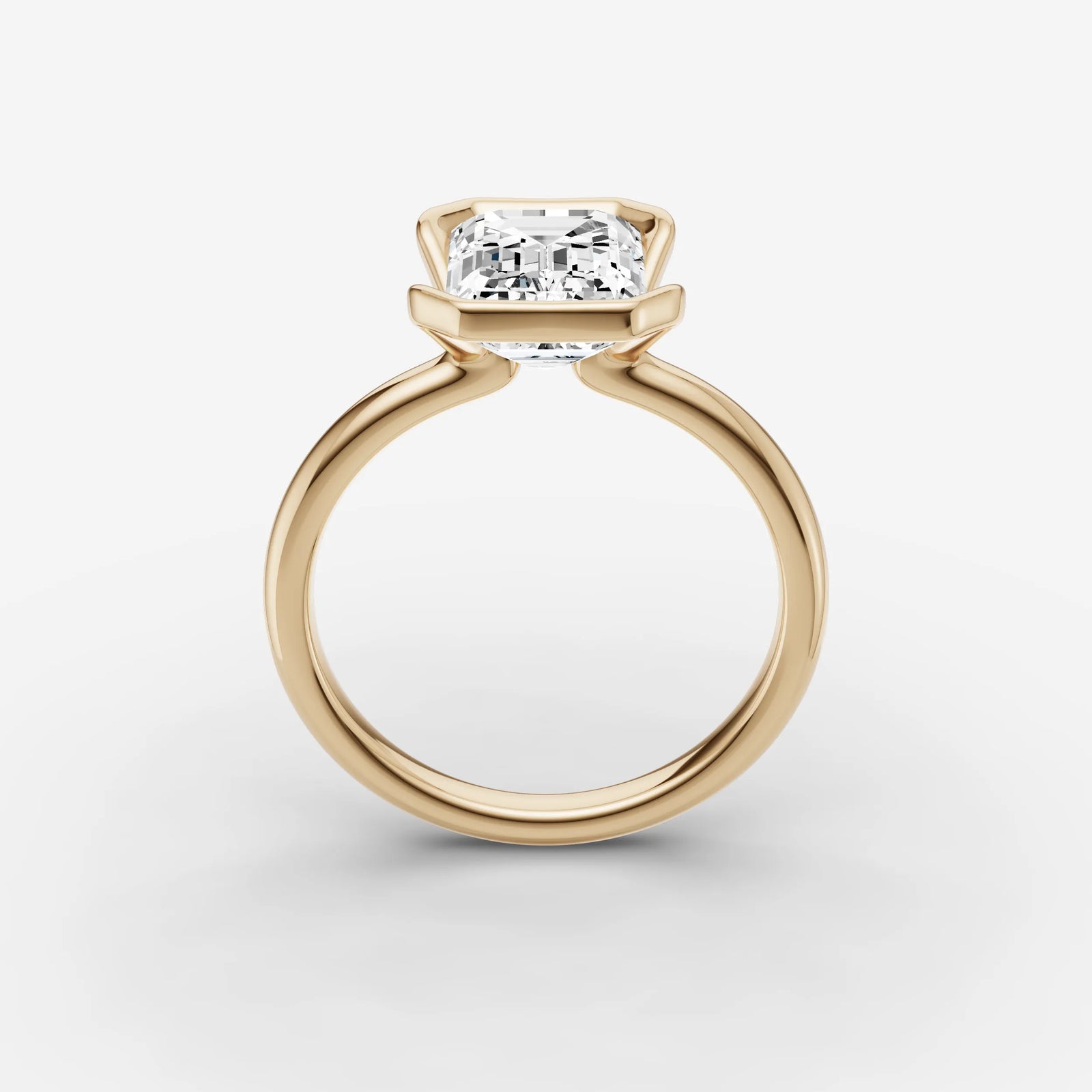 Demi emerald diamond setting in gold, side view