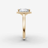 Aurore emerald diamond setting in gold, angled view