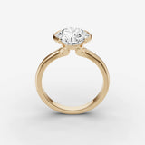 Demi round diamond setting in gold, side view