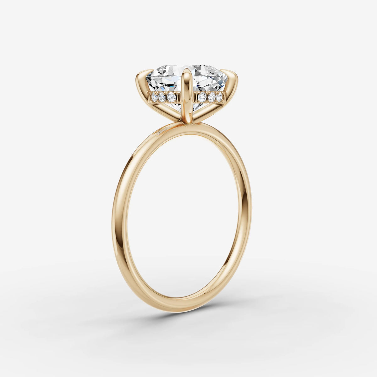 Mystere cushion diamond setting in gold, detail view