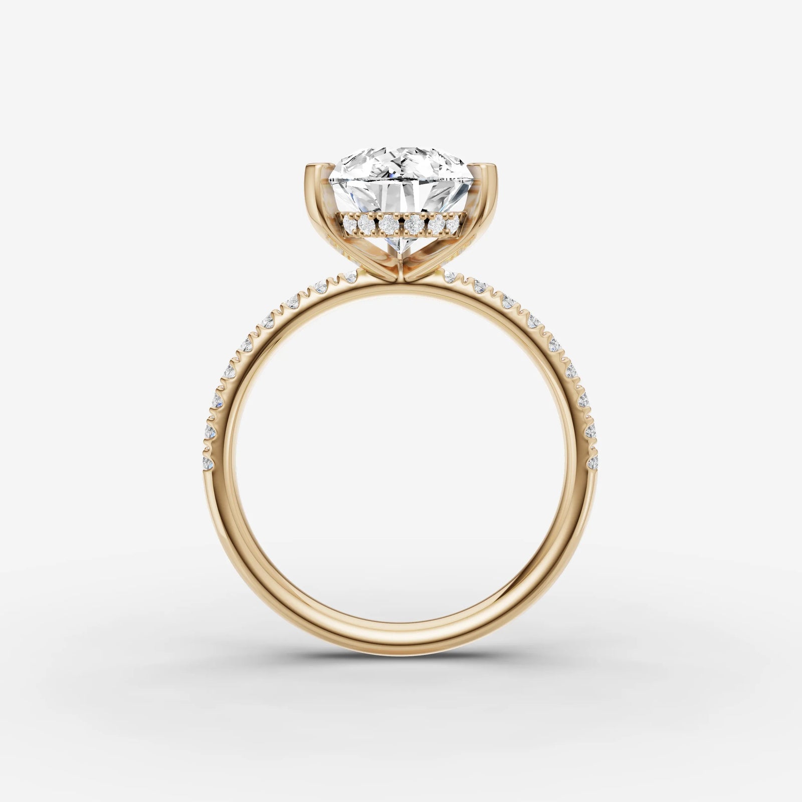 Mystere Etoile pear diamond setting in gold, profile angle
