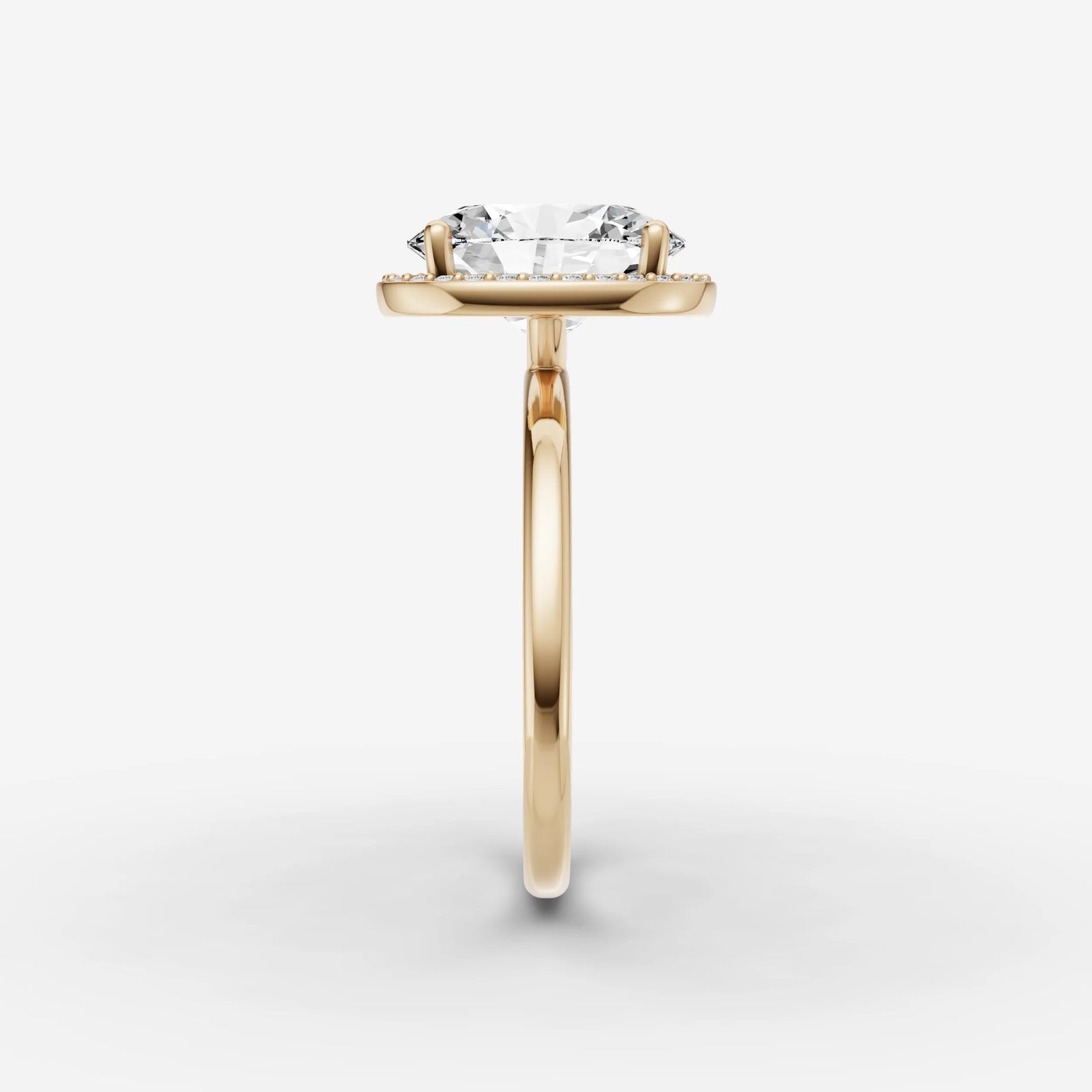 Aurore oval diamond setting in gold, angled view