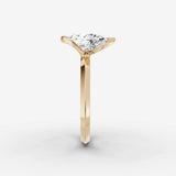 Demi pear diamond setting in gold, angled view