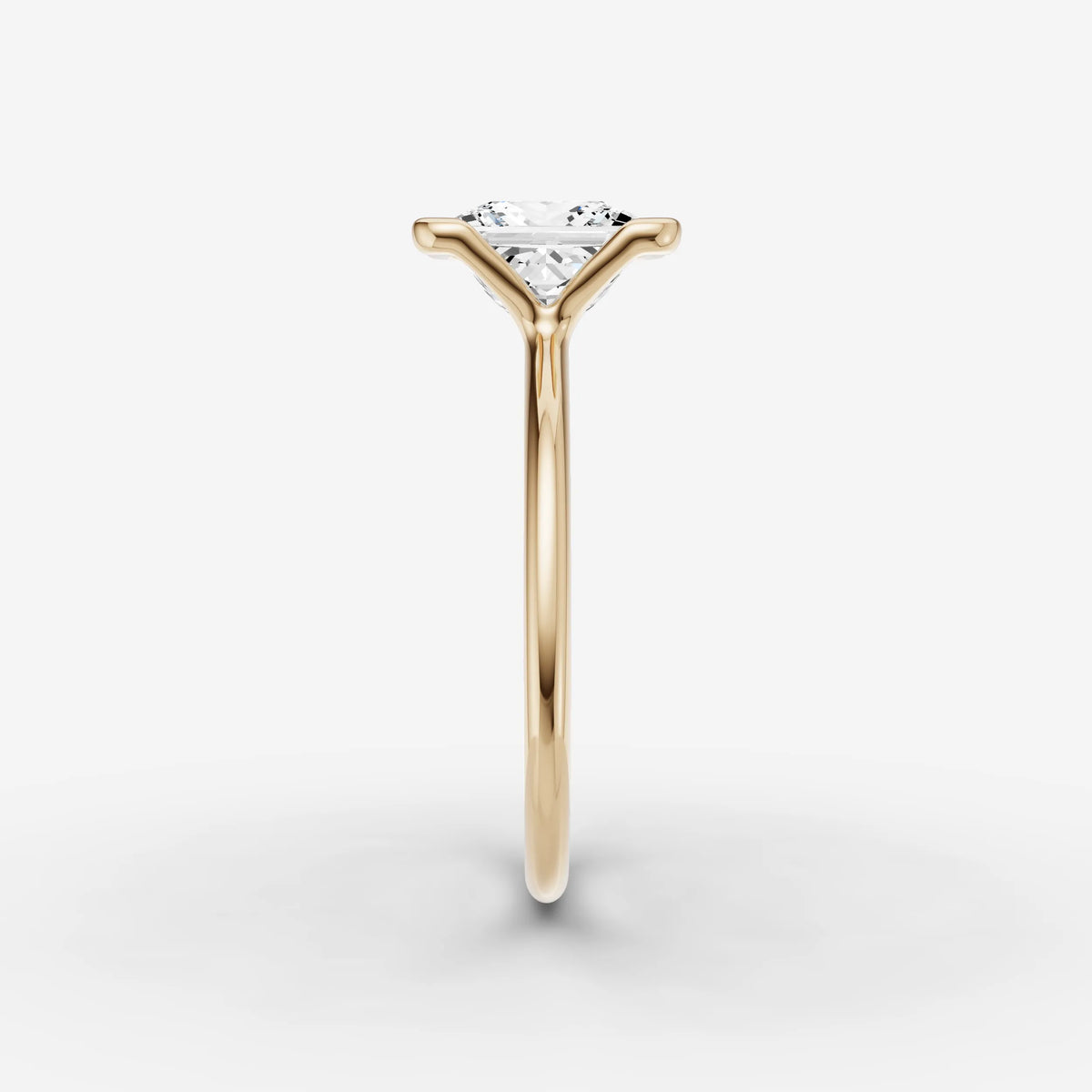 Demi princess diamond setting in gold, angled view