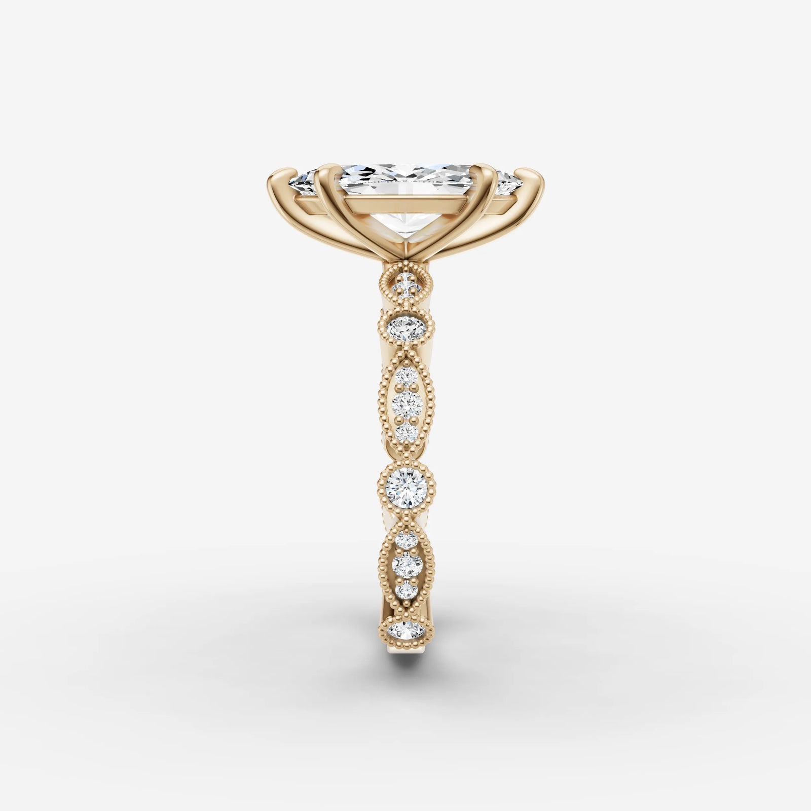 Heritage marquise diamond setting in gold, angled view