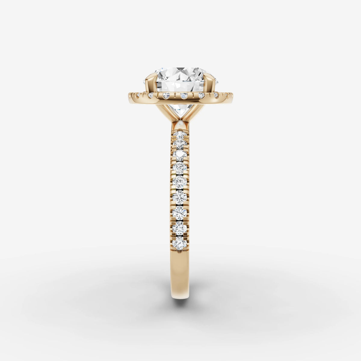 Aurore Etoile round diamond setting in gold, angled view
