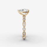 Heritage pear diamond setting in gold, angled view