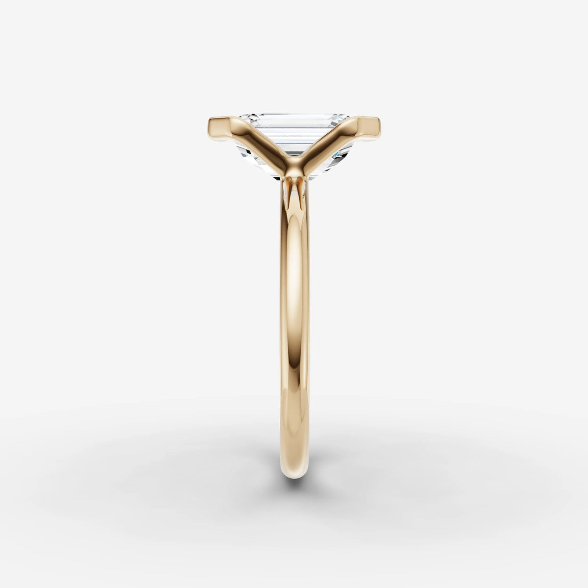 Demi emerald diamond setting in gold, angled view