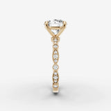 Heritage round diamond setting in gold, angled view