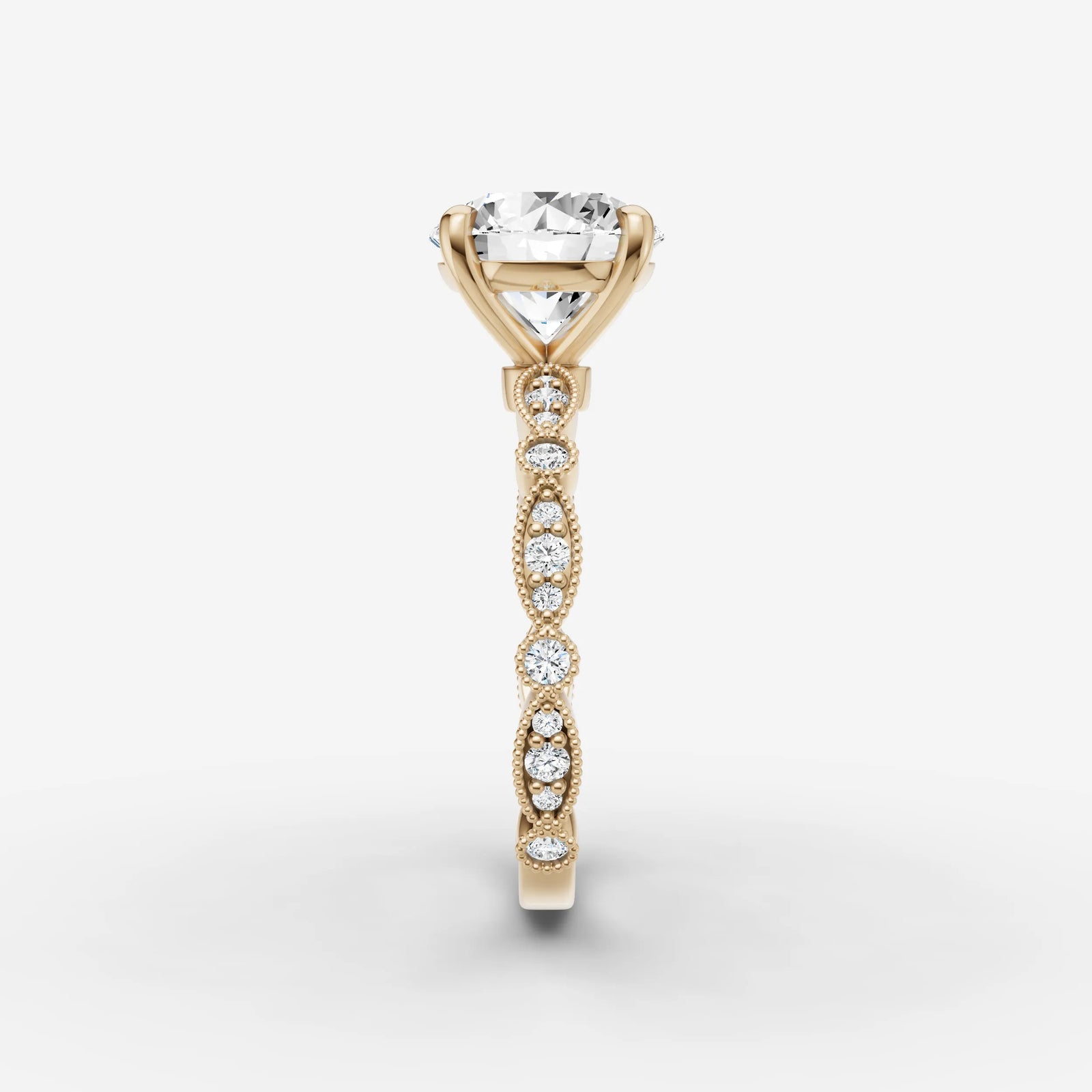 Heritage round diamond setting in gold, angled view