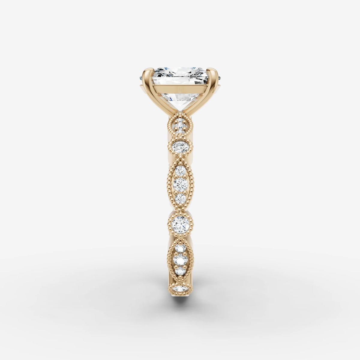 Heritage elongated cushion diamond setting in gold, angled view