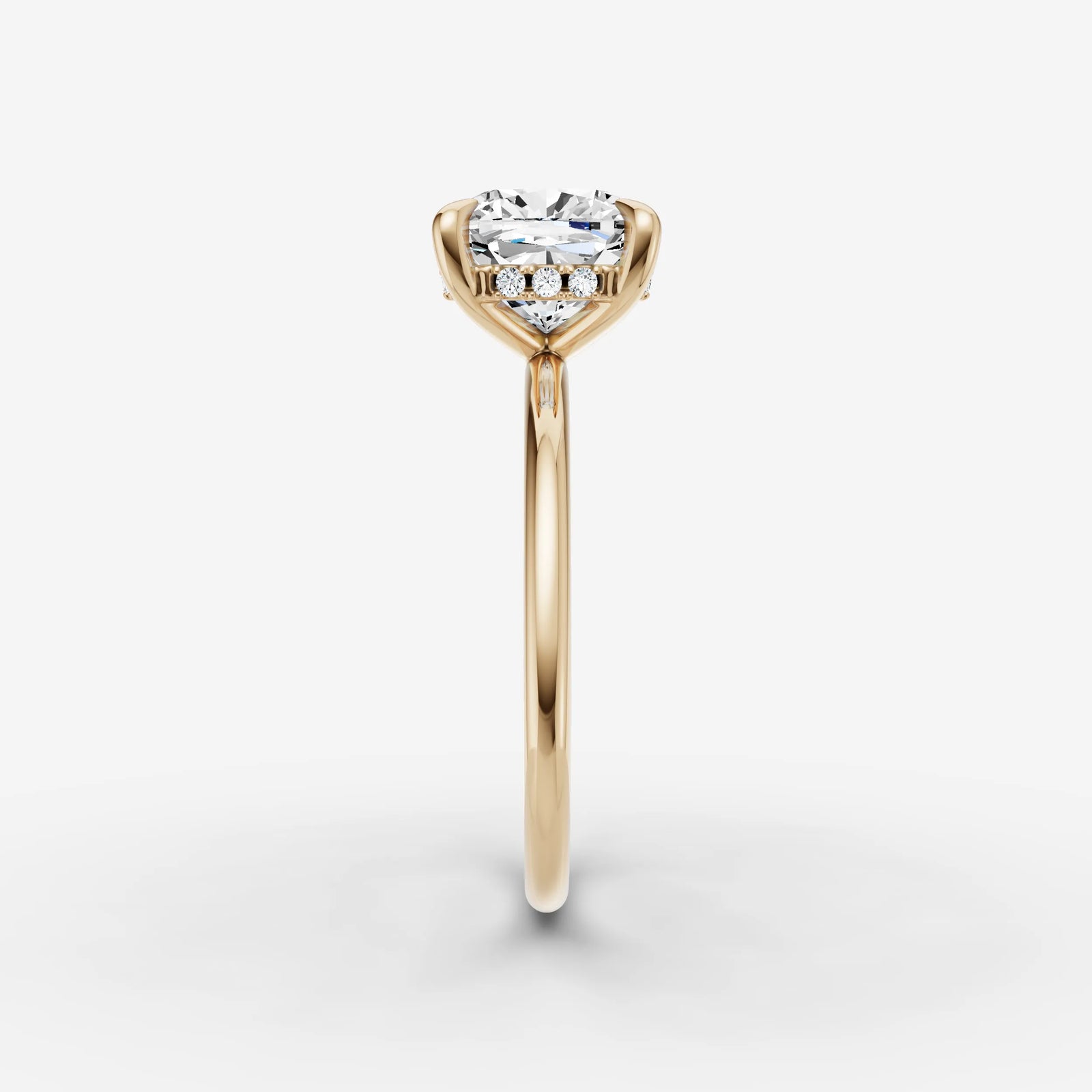 Mystere cushion diamond setting in gold, angled view