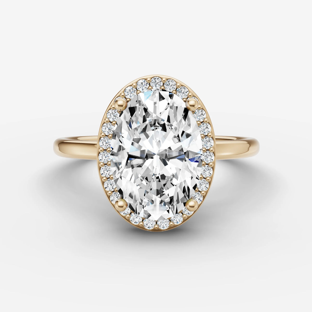Aurore oval diamond setting in gold, front view