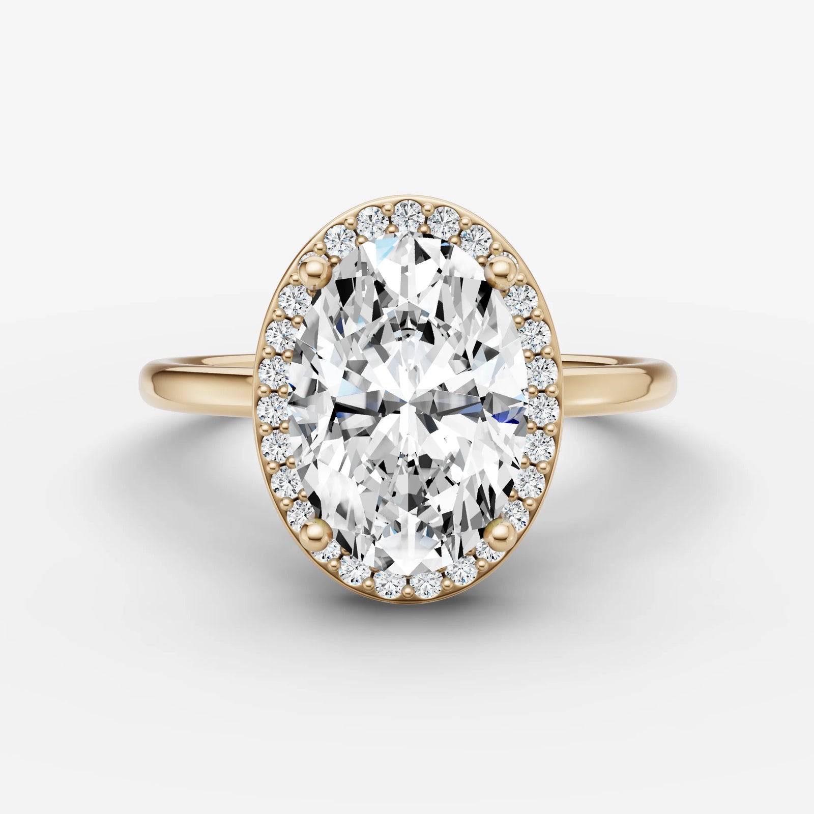 Aurore oval diamond setting in gold, front view