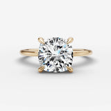 Mystere cushion diamond setting in gold, front view