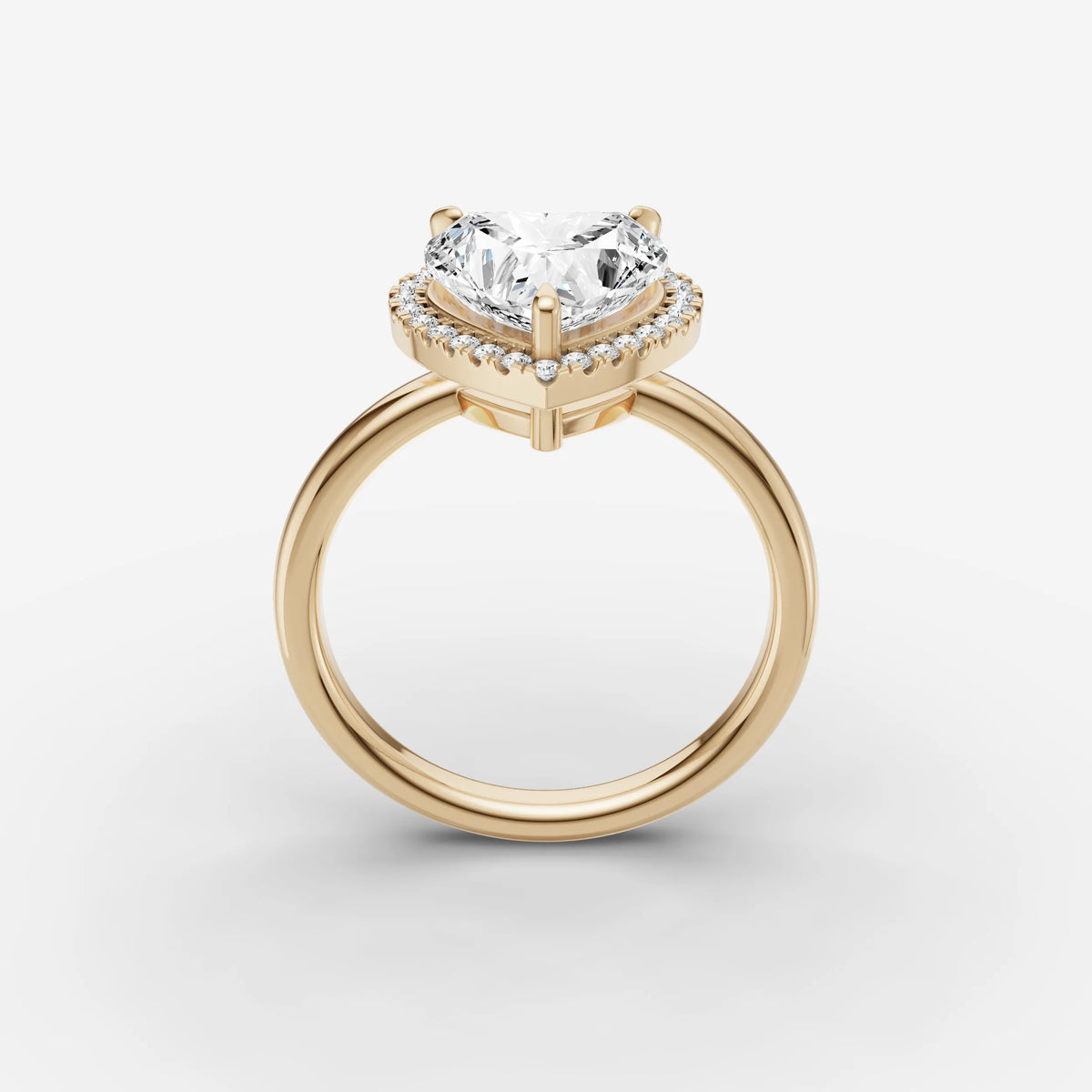 Aurore heart diamond setting in gold, side view