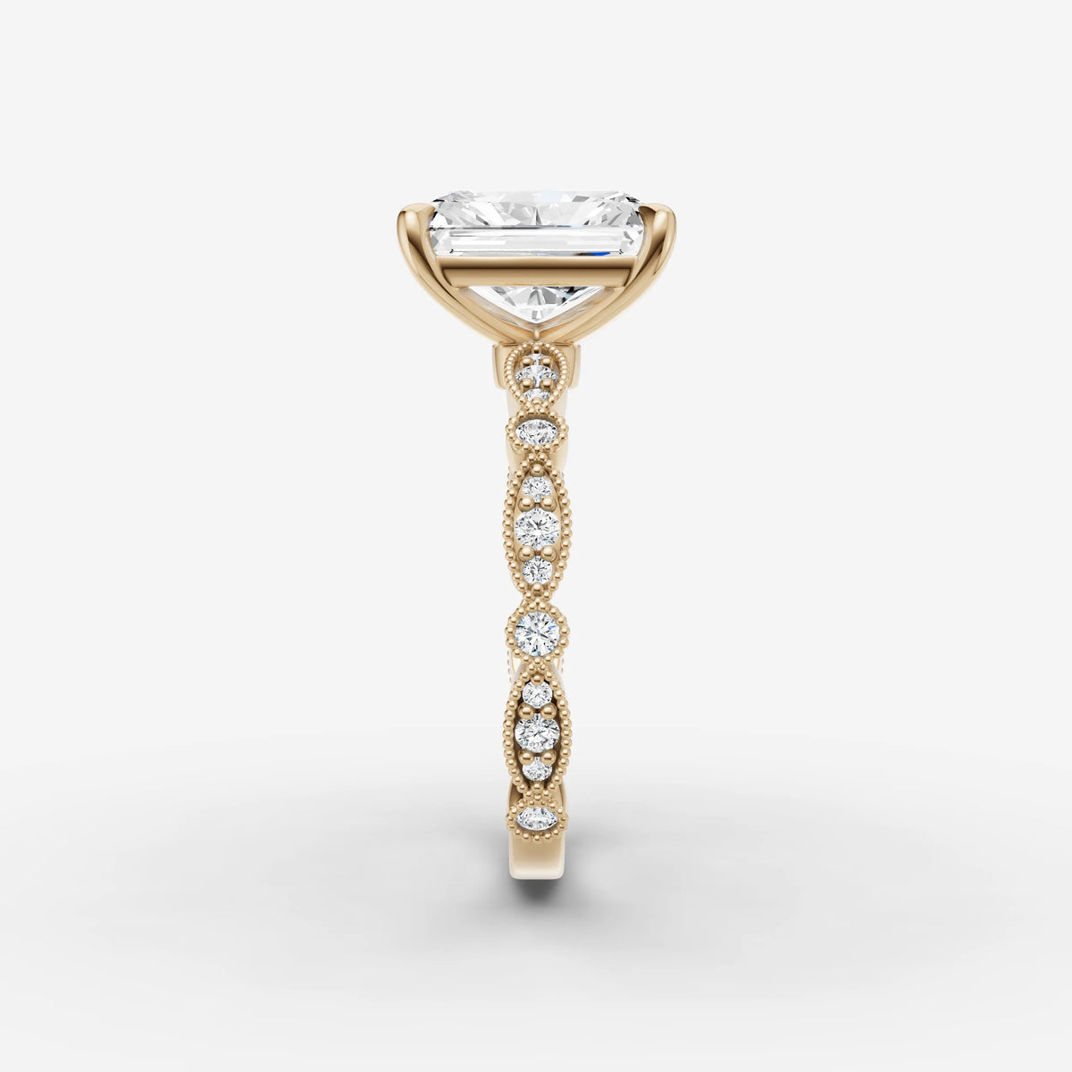 Heritage radiant diamond setting in gold, angled view