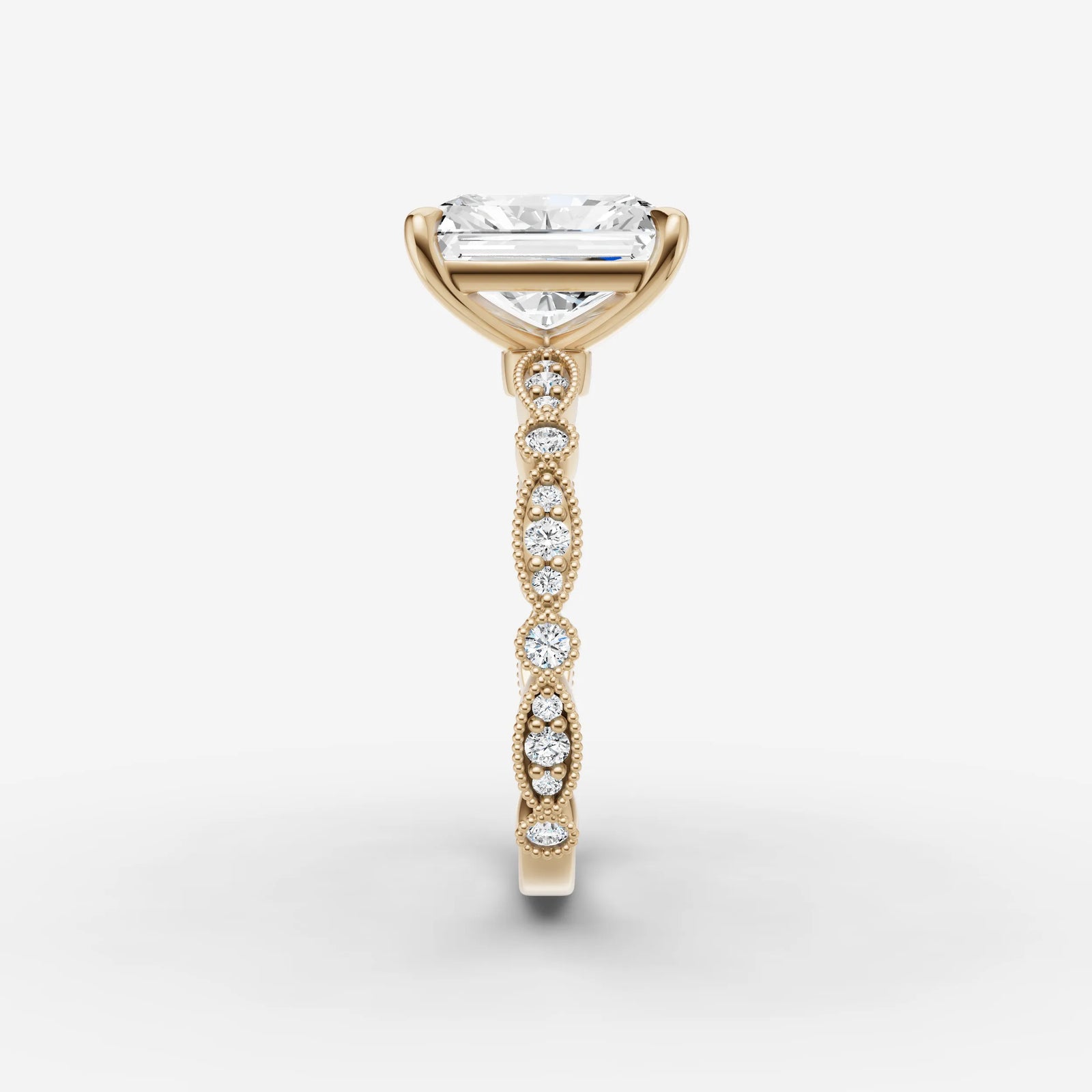 Heritage radiant diamond setting in gold, angled view