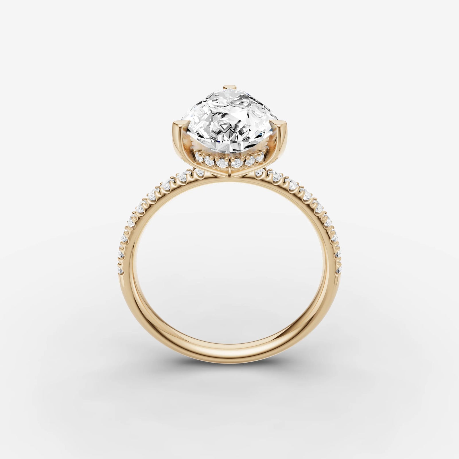 Mystere Etoile pear diamond setting in gold, side view