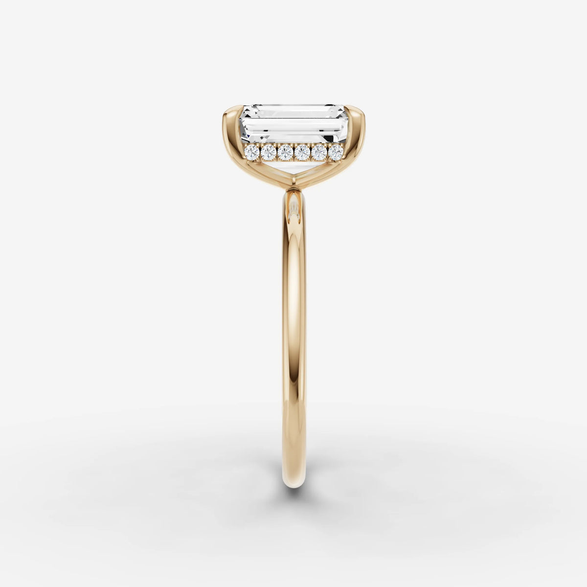 Mystere emerald diamond setting in gold, angled view