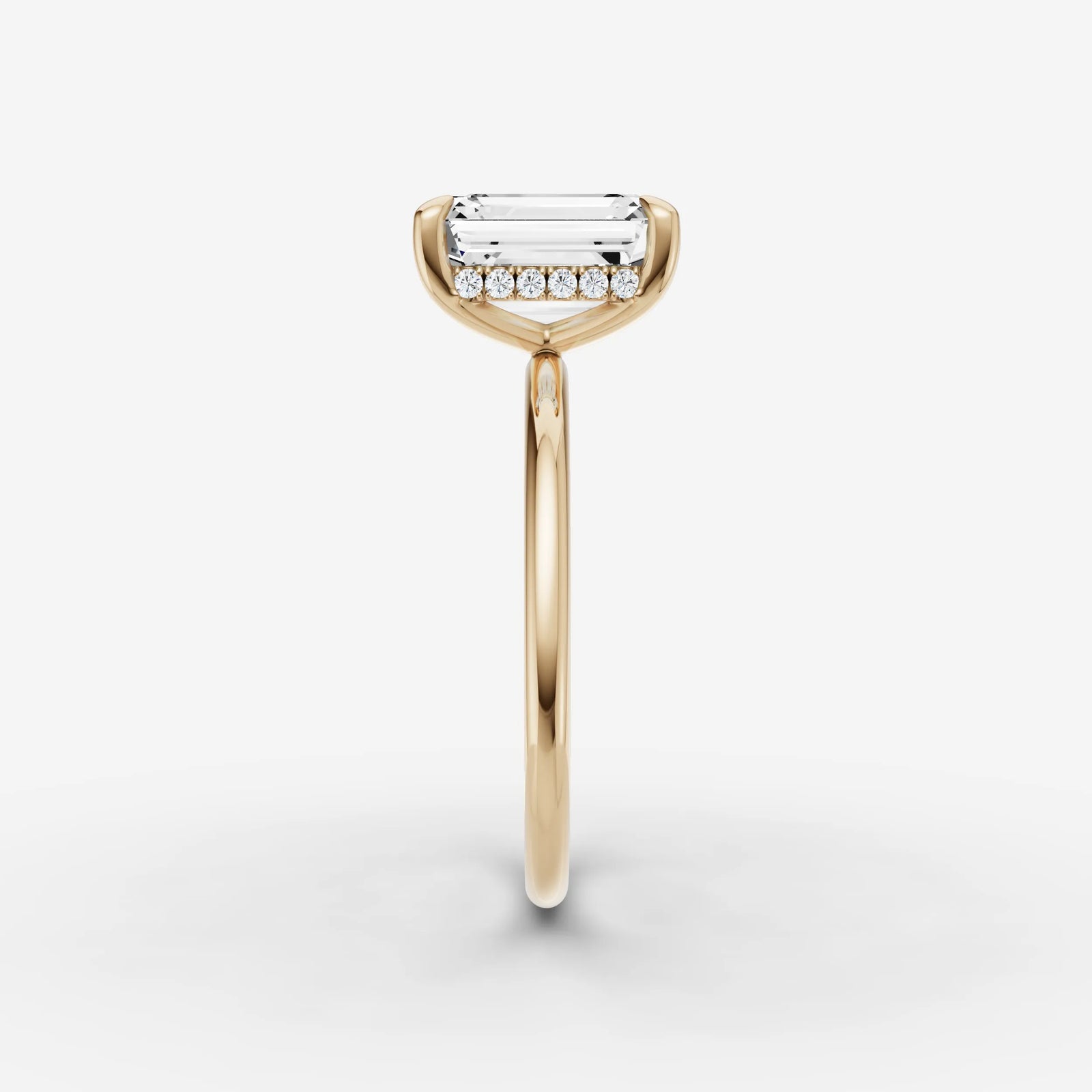Mystere emerald diamond setting in gold, angled view