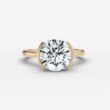 Demi round diamond setting in gold, front view