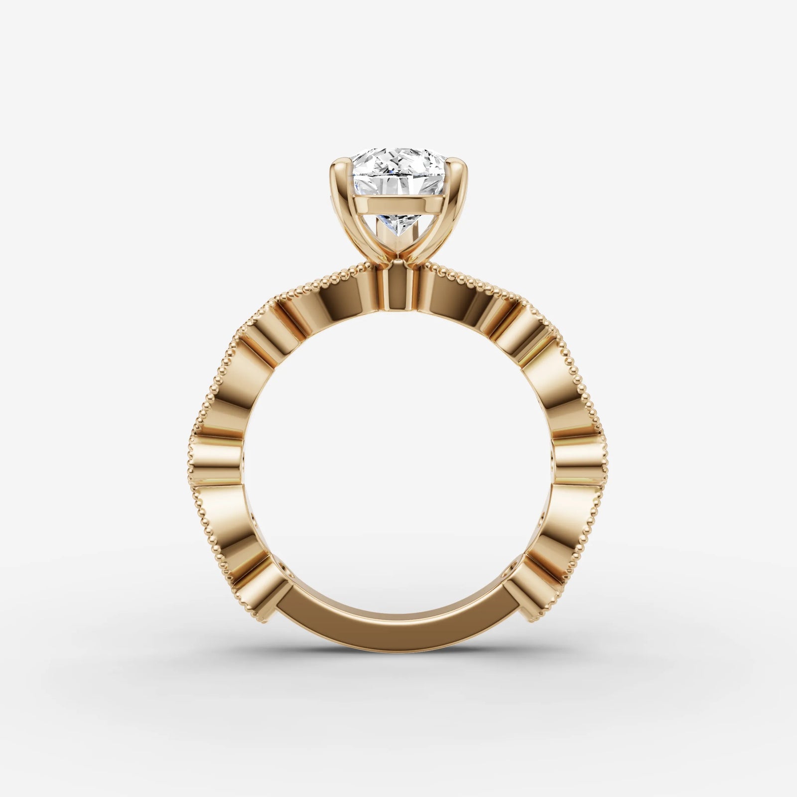 Heritage pear diamond setting in gold, profile angle