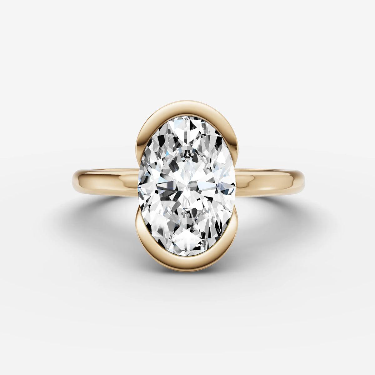 Demi oval diamond setting in gold, front view