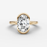 Demi oval diamond setting in gold, front view