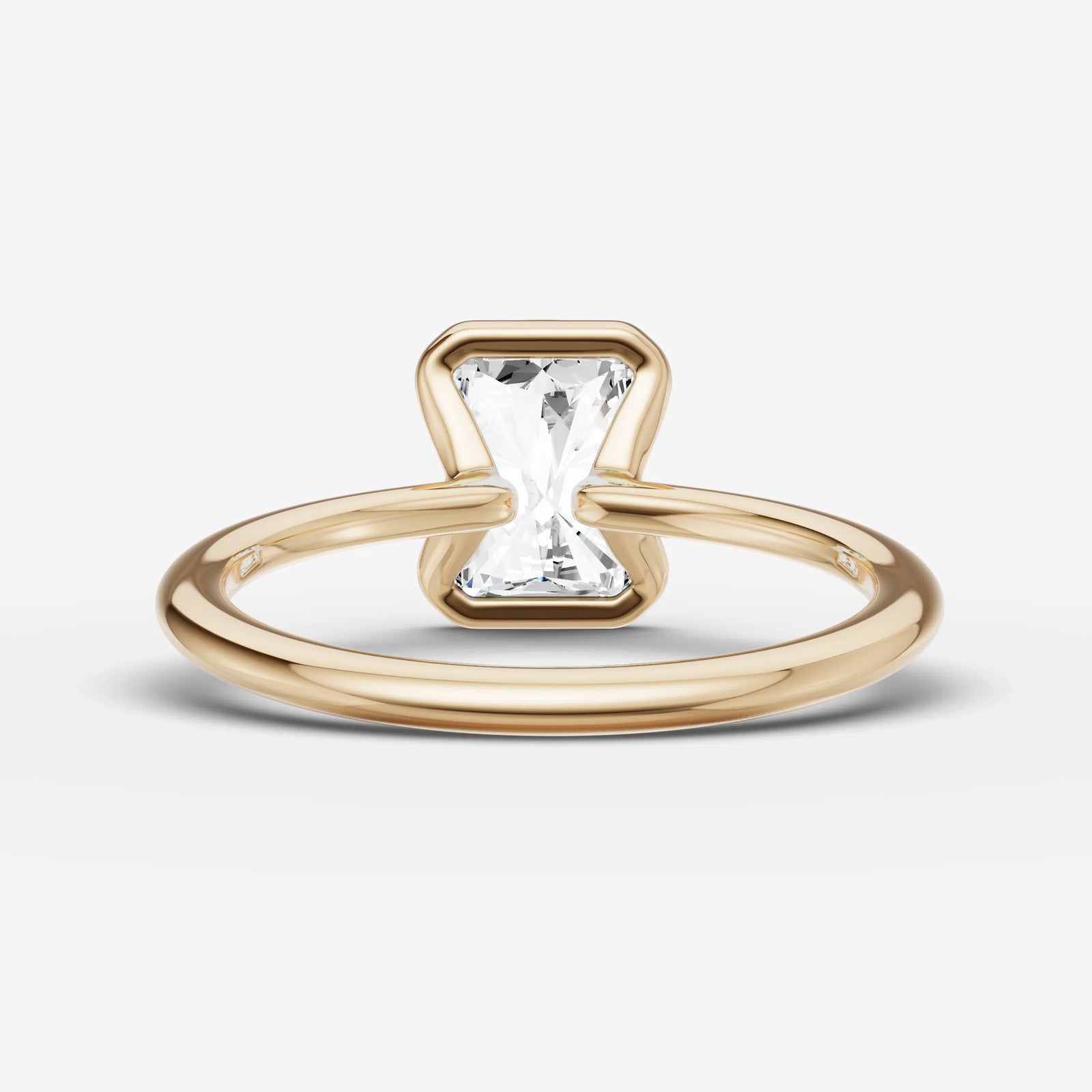 Demi radiant diamond setting in gold, top view