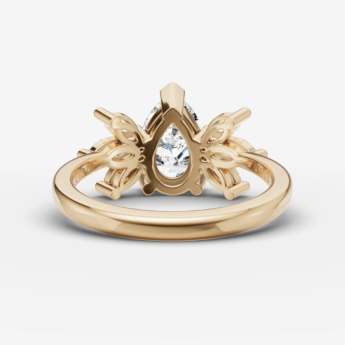 Fleur pear diamond setting in gold, top view