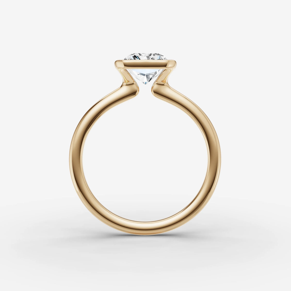 Demi radiant diamond setting in gold, profile angle