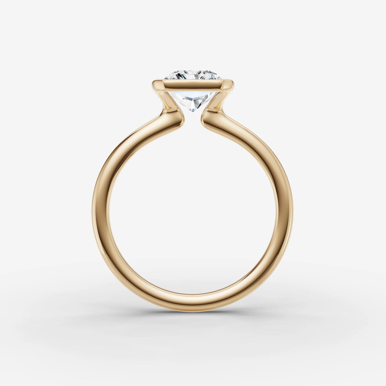 Demi radiant diamond setting in gold, profile angle