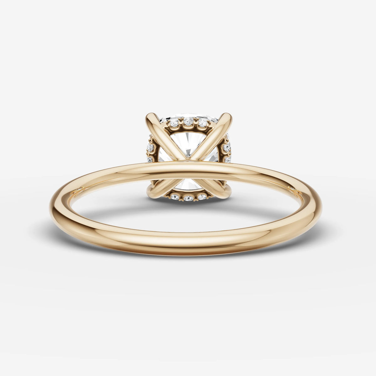 Mystere cushion diamond setting in gold, top view